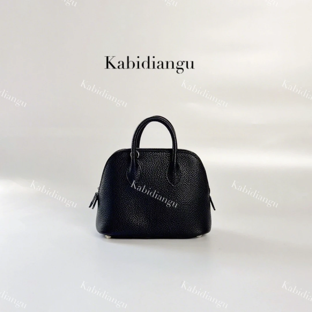 kabidiangu/卡比典古 新款高定头层牛皮时尚高级手提斜挎贝壳包