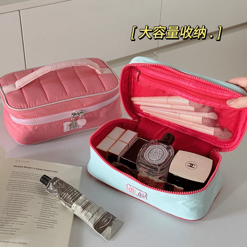 化妆包女便携外出手提收纳包2025新款高端大容量化妆品旅行洗漱包