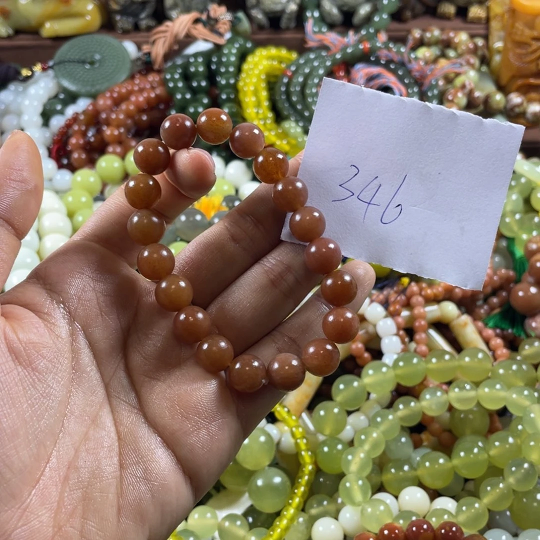 栗***易未镶嵌蛇纹石玉手串