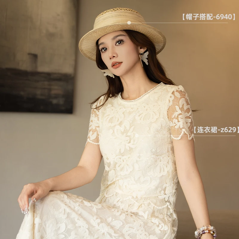 Z629休闲时尚白色宽松镂空上衣裙子套装