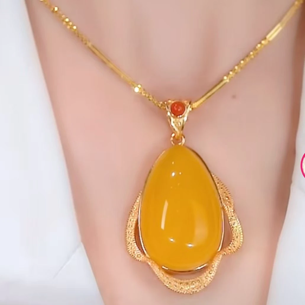 钛钢仿水晶吊坠 新款轻奢时尚百搭冰黄海洋之心复古水滴气质项链