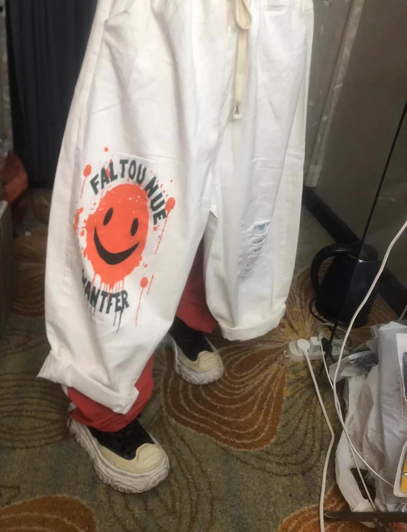 白色笑脸潮牌休闲裤