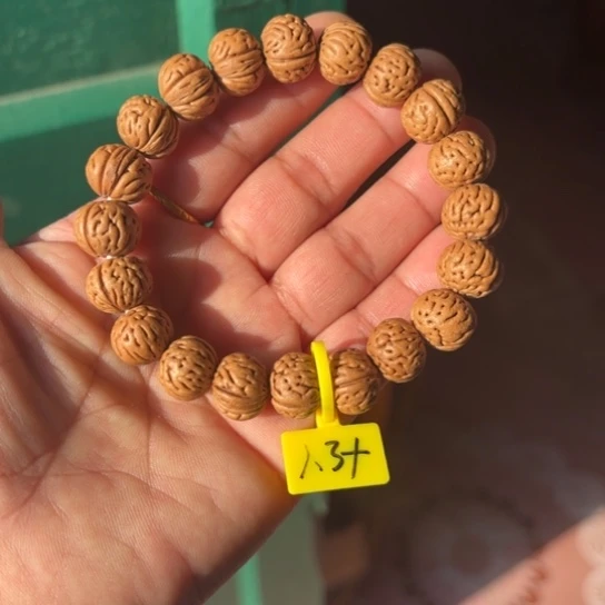 木质野生桃核小磨盘齐修