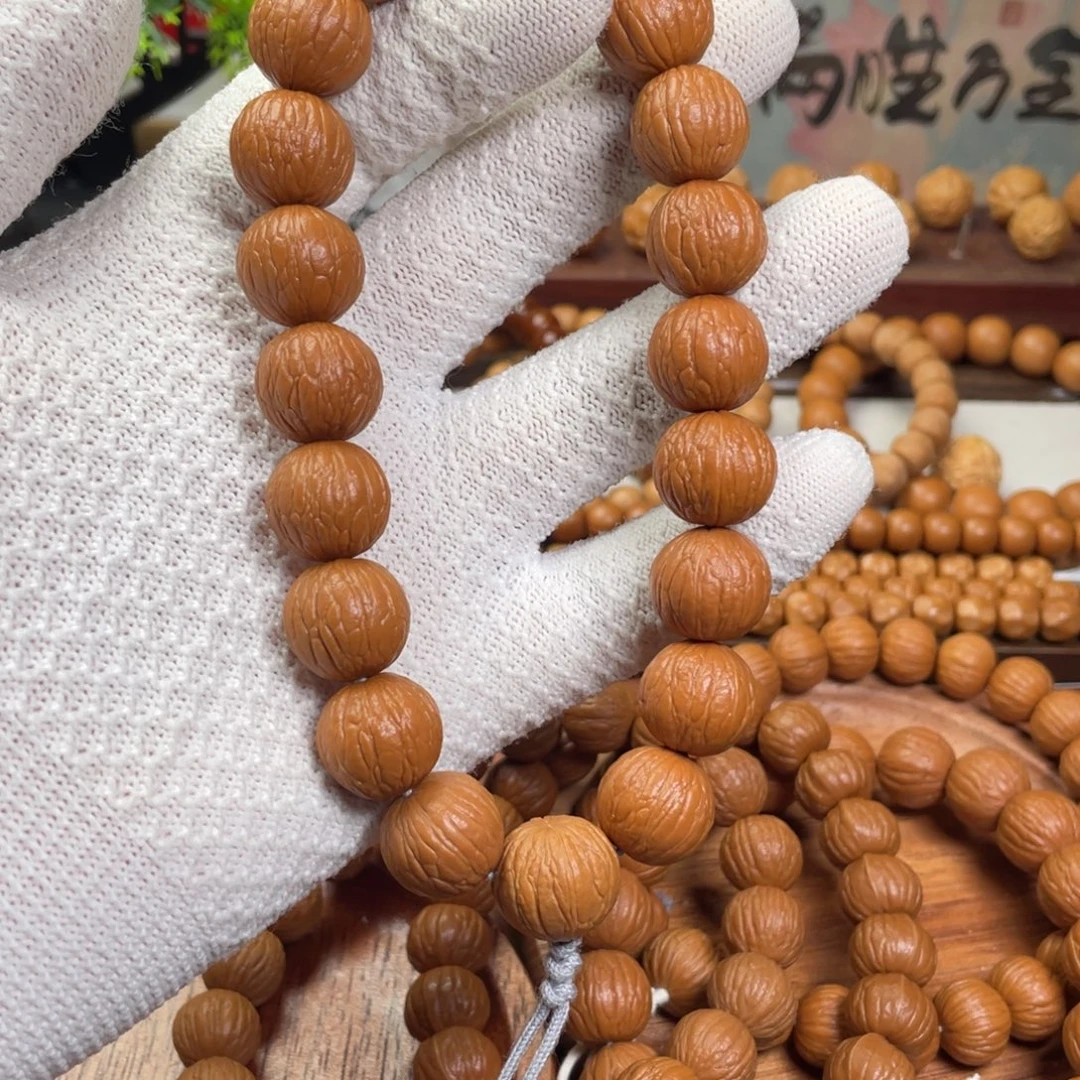 砺***行猴头核桃手串聚宝盆