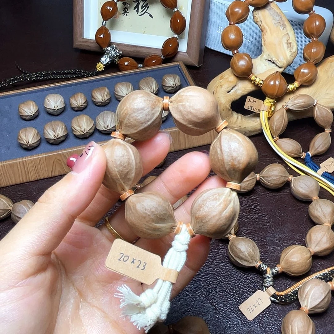 桃***踪橄榄核手串梅林铁核.20*23