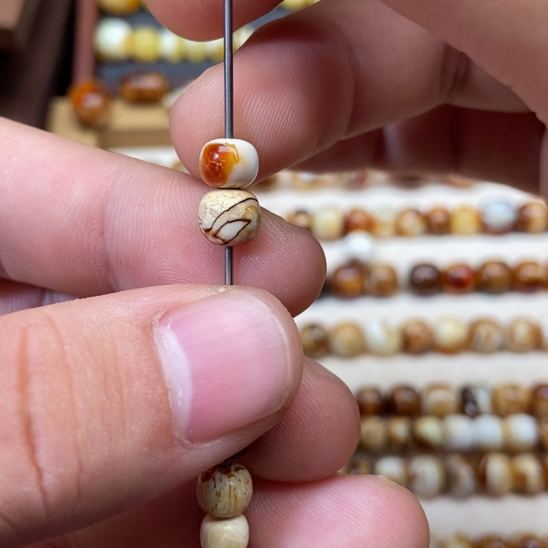 清***羽琥珀未镶嵌珠宝奇石6.5mm