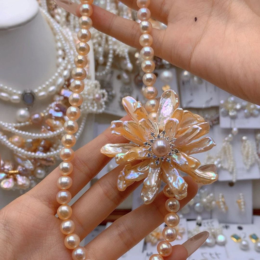 合金耳环淡水珍珠阳****)