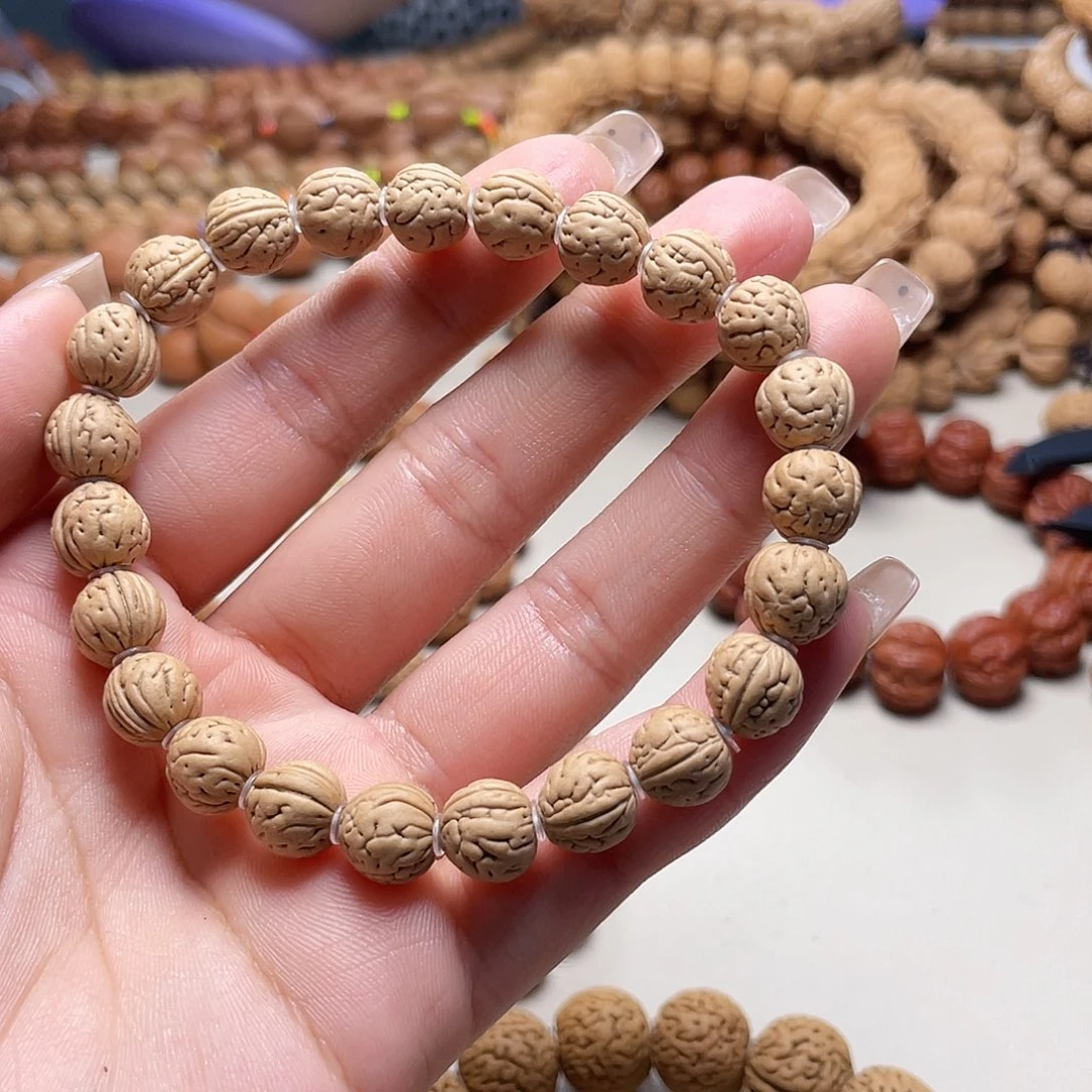 E***i文玩核桃手串桃核