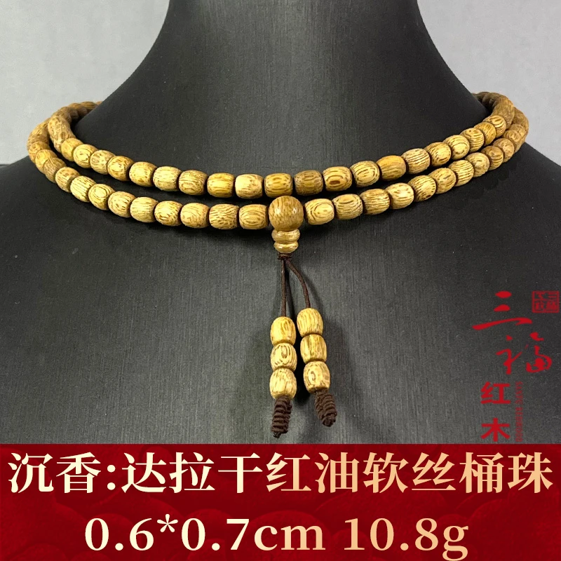 103181 达拉干红油软丝桶珠 沉香