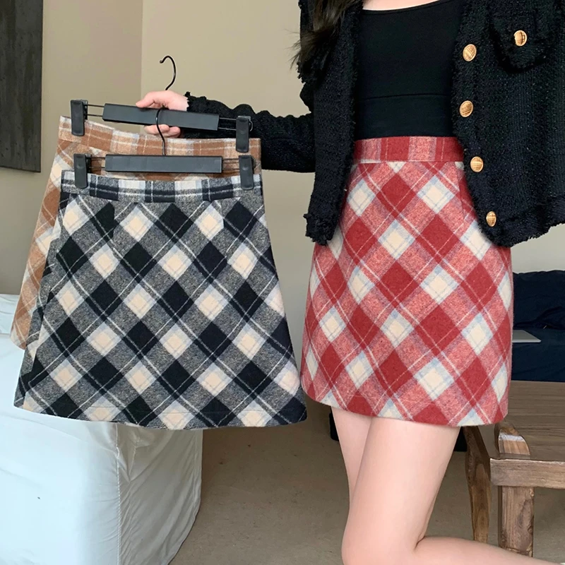 Q2025秋冬新款胖mm大码女百搭毛呢chic保暖斜格包臀A字短裙 18166