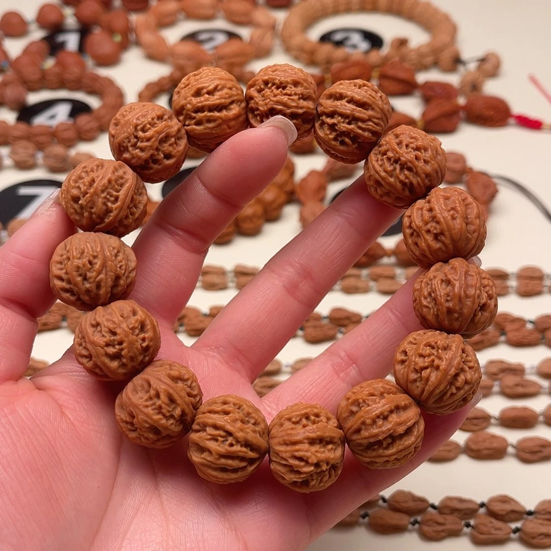 旭***文玩核桃吊坠珊瑚纹京八棱