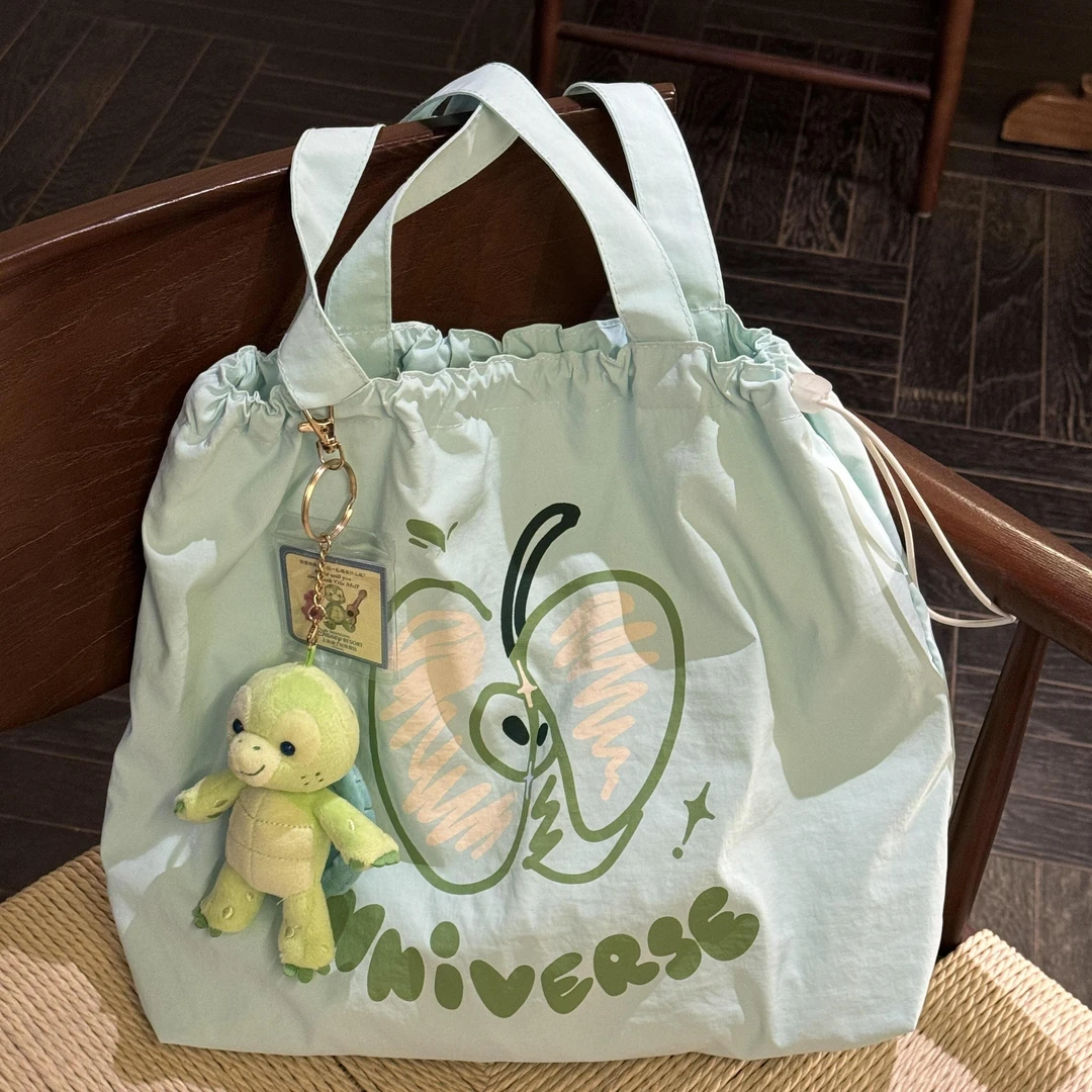 夏日青苹果抽绳单肩包包女百搭大容量多巴胺小清新上课通勤托特包