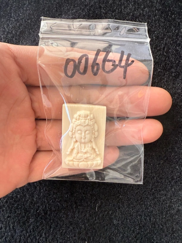 00664猛犸牙观音牌吊坠