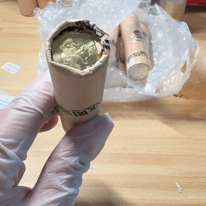 其他普通金属1卷50枚，一轮虎币，不带桶