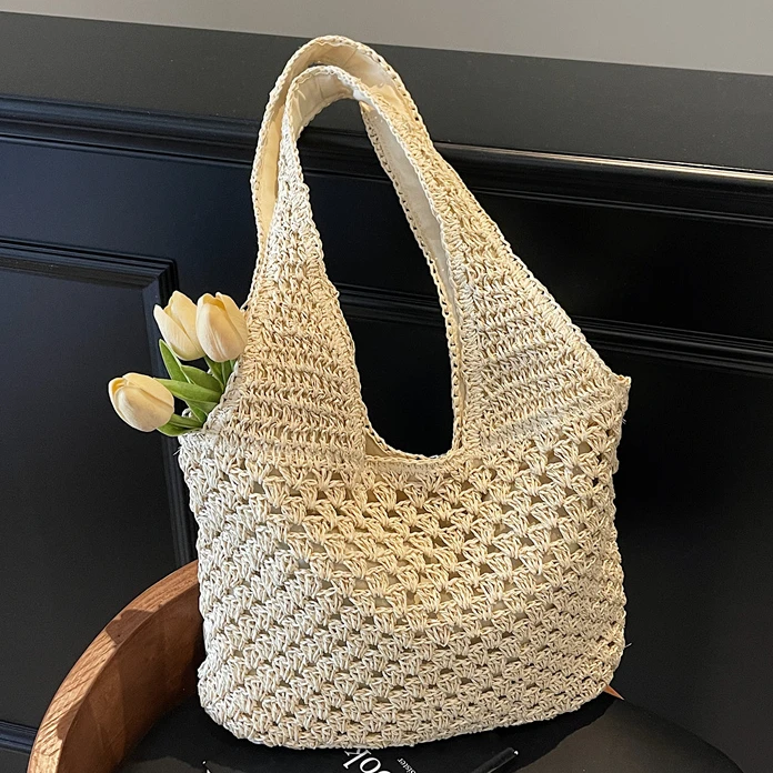 大容量编织包包女2025新款海边度假草编包镂空通勤单肩托特包