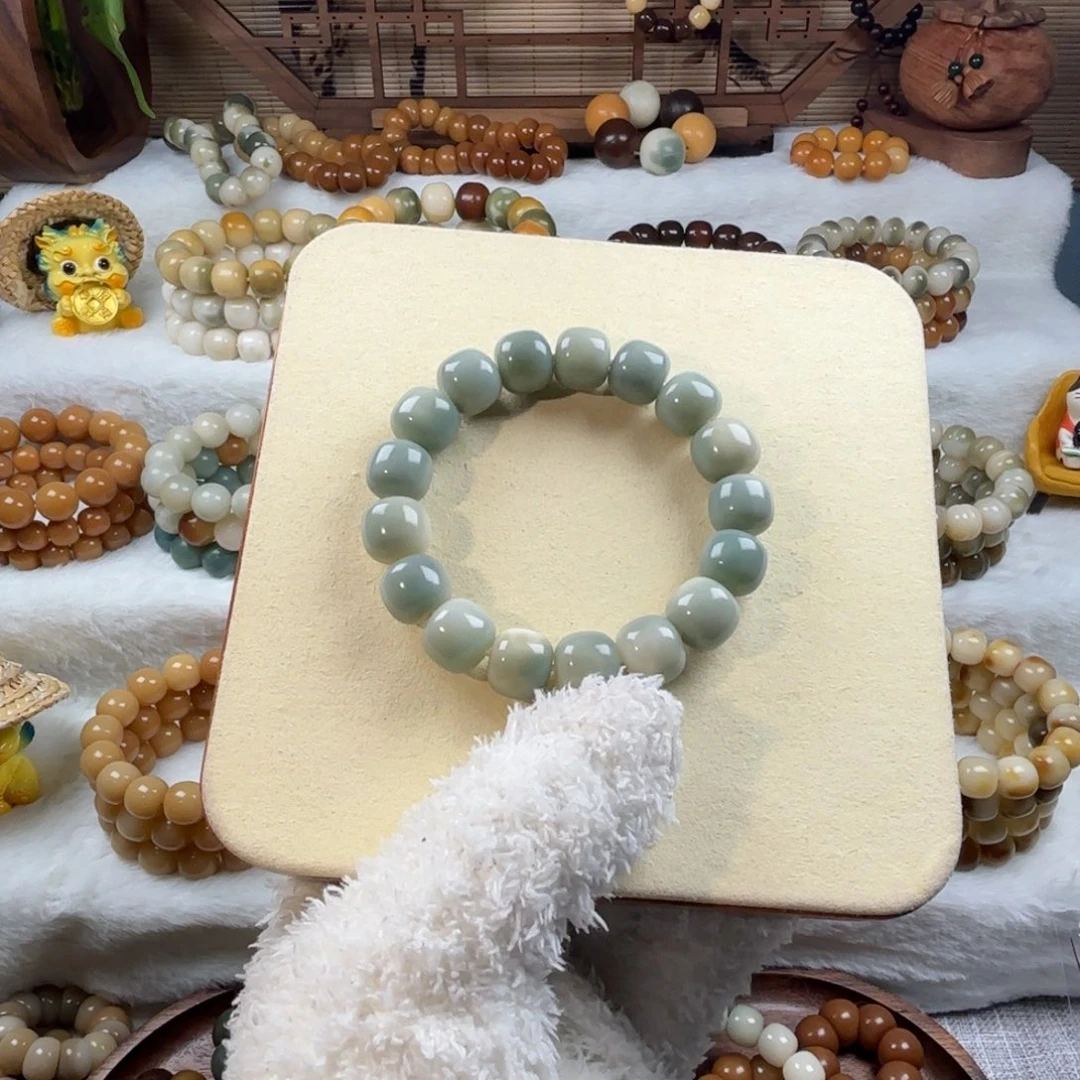 菩提根/象牙果手串请****谢蓝绿色飘花