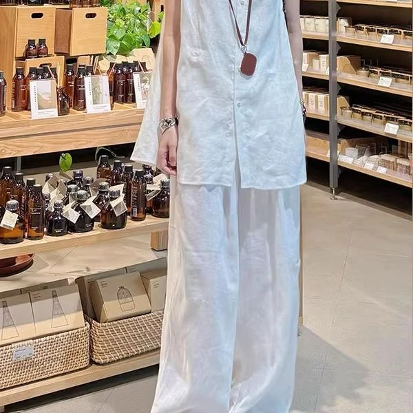 极简风时尚亚麻套装女2025夏款小众设计感白色无袖上衣裤子两件套