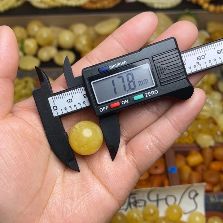 小***哥蜜蜡未镶嵌珠宝奇石天然蜜蜡散珠微瑕一粒