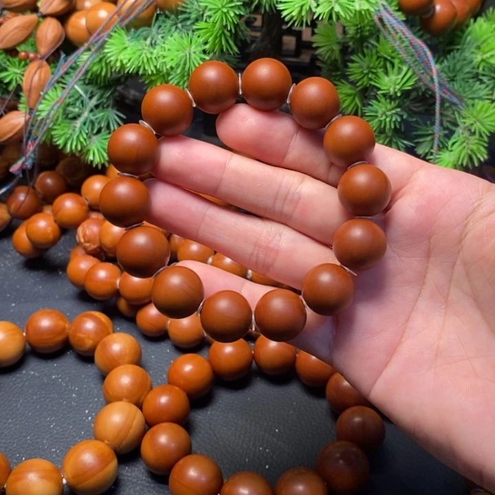 三***练手串橄榄核1.55福利光珠