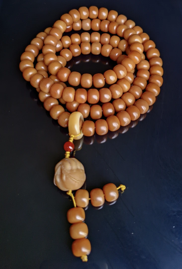 菩提根8*10焦糖色桶珠挂脖