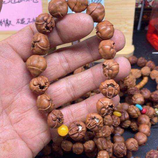 幽**适龙纹桃核无像手串