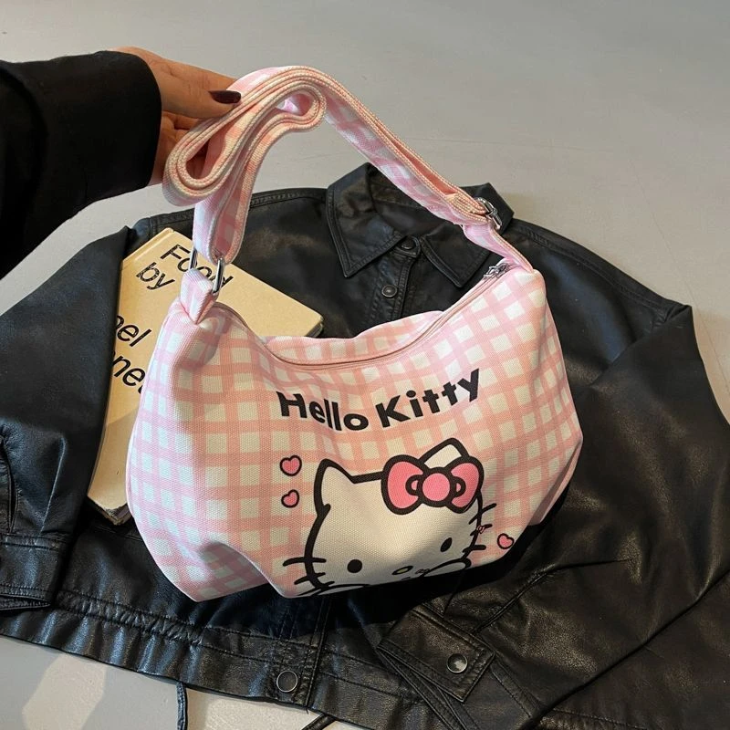 卡通凯蒂猫格子帆布包2025新款大容量女生轻便单肩斜挎包儿童包包