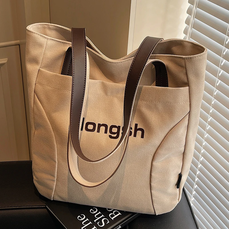 大容量包包2025新款包包女百搭妈咪帆布包大学生上课单肩托特包