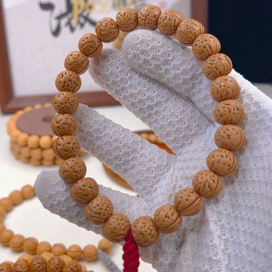 九***日桃核手串1.2加「鬼脸」野生桃核手持