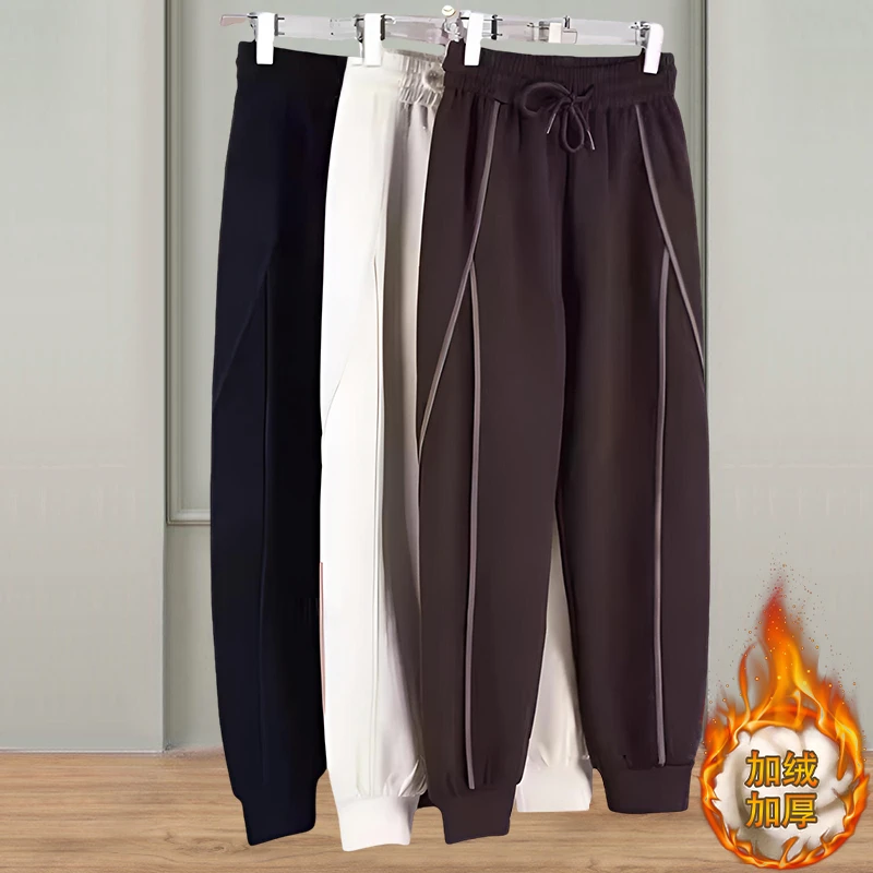 冬款加绒加厚高档松紧腰束脚裤大码宽松时尚百搭保暖休闲裤子潮流