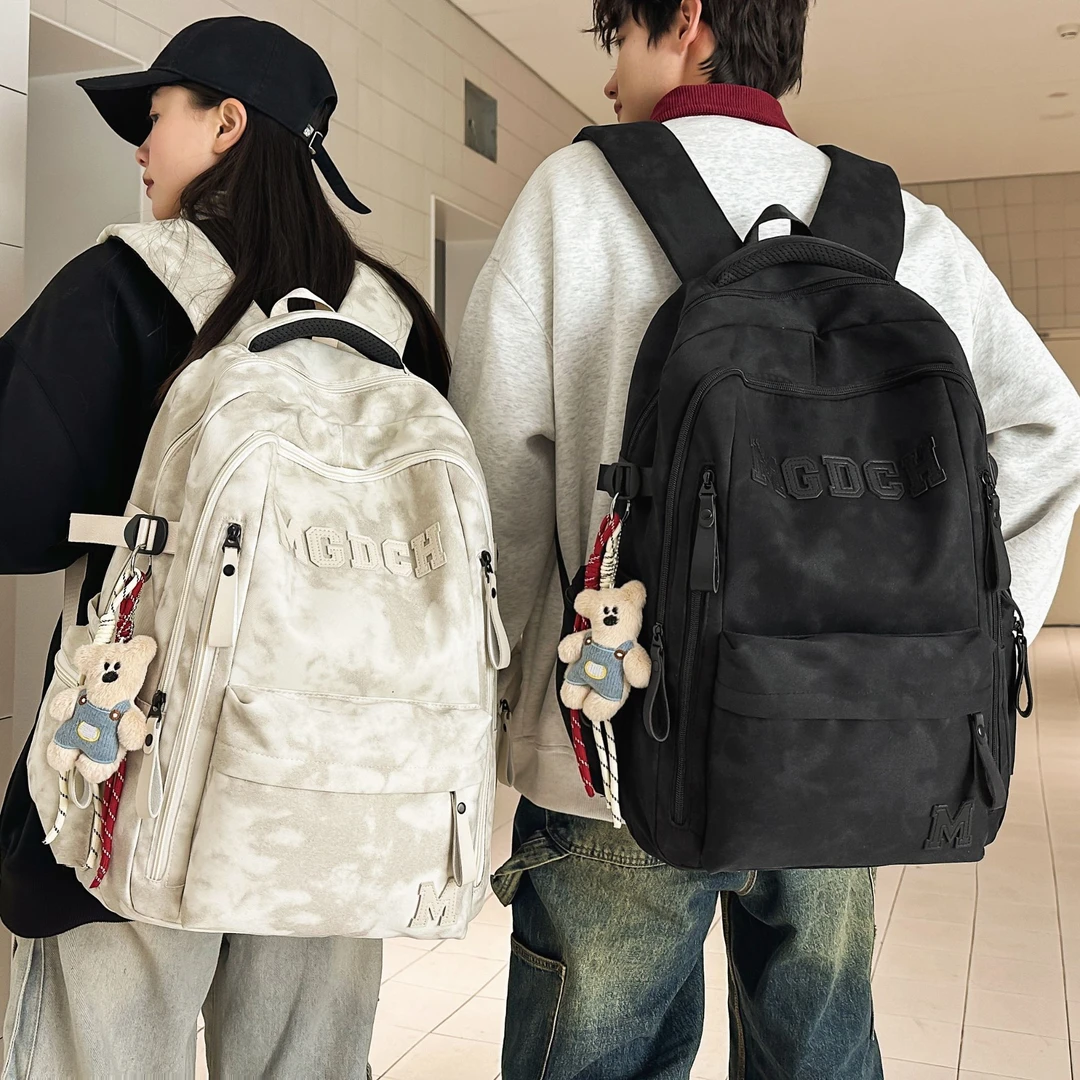 减负护脊书包初中书包高中大学背包大容量扎染晕染防水旅游双肩包