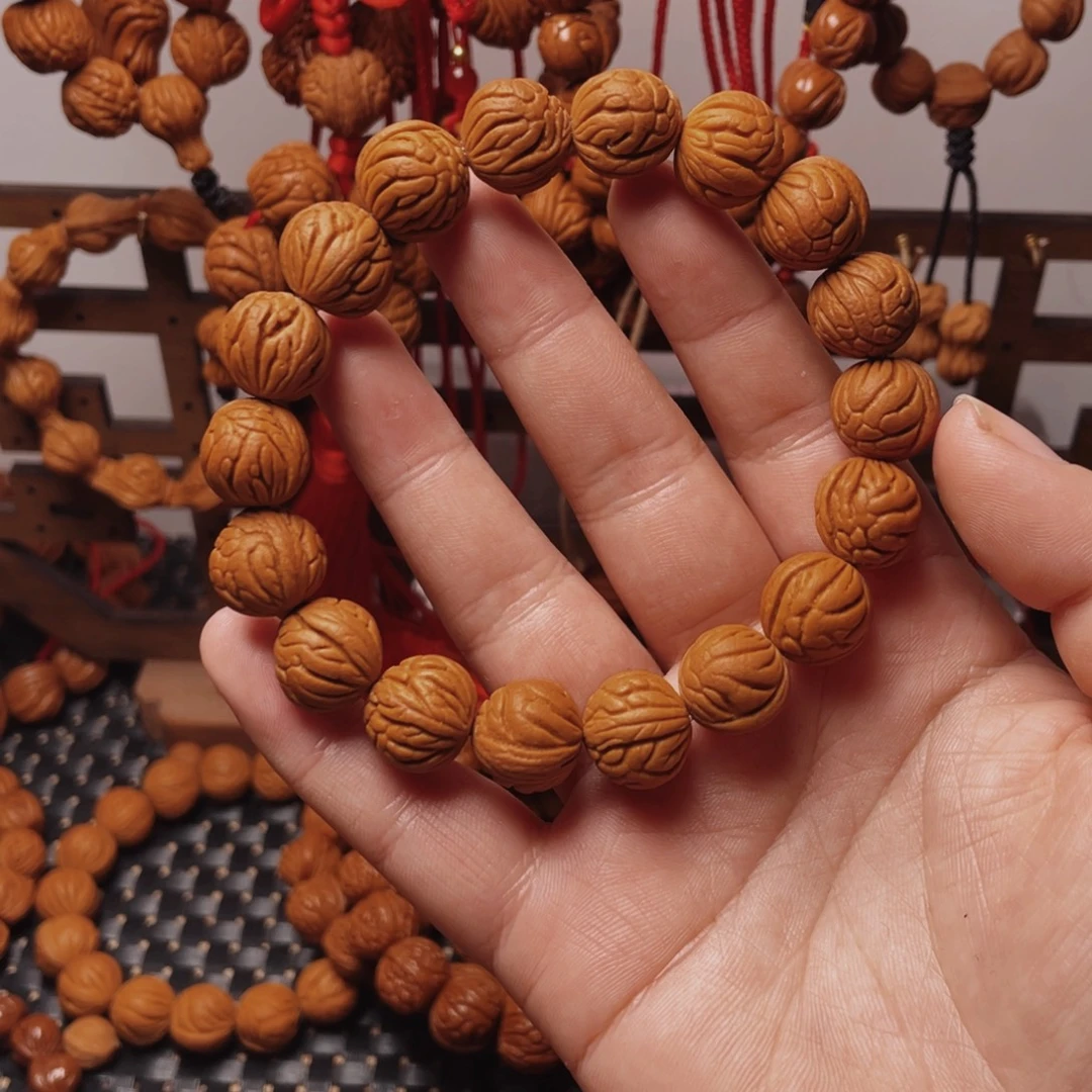 木质类龙纹桃枭手串