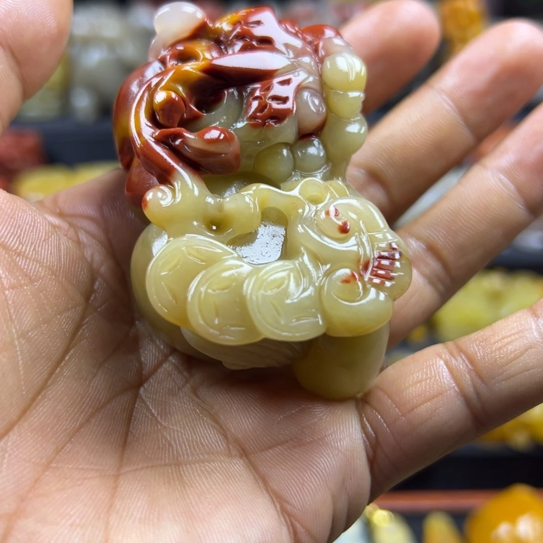 李***翰石英质玉（黄龙玉）未镶嵌手把件
