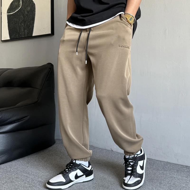 春夏美式休闲痞帅高端薄款针织卫裤男宽松抽绳百搭运动束脚裤子潮