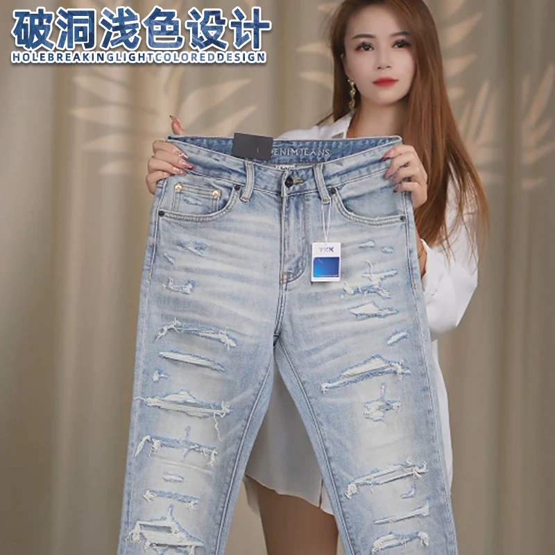 假破洞牛仔裤男士春季新款修身小脚裤浅蓝色潮流轻奢欧货长裤子男