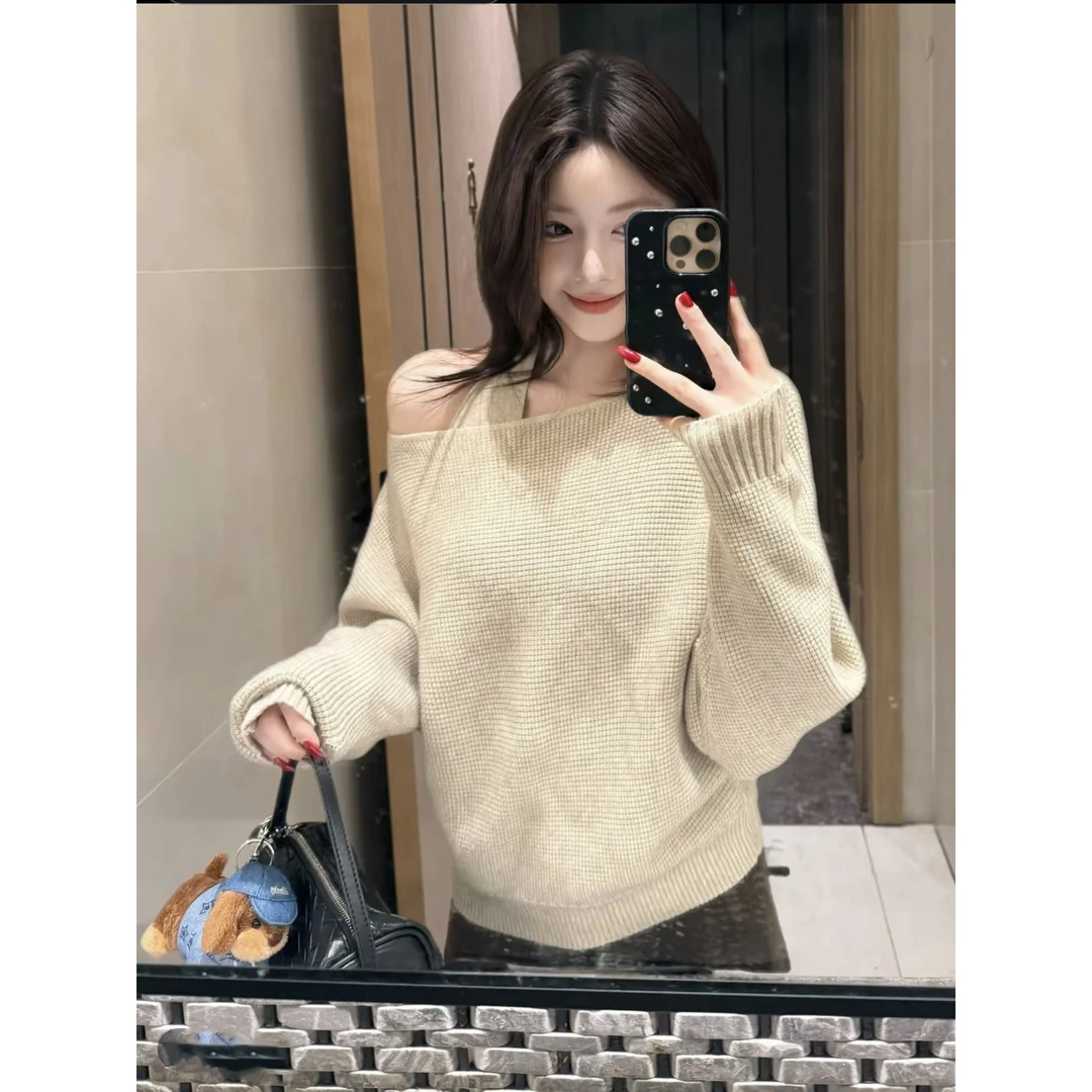 已到货CHUN韩里韩气多种穿法秋冬气质华夫格宽松针织衫背心套装