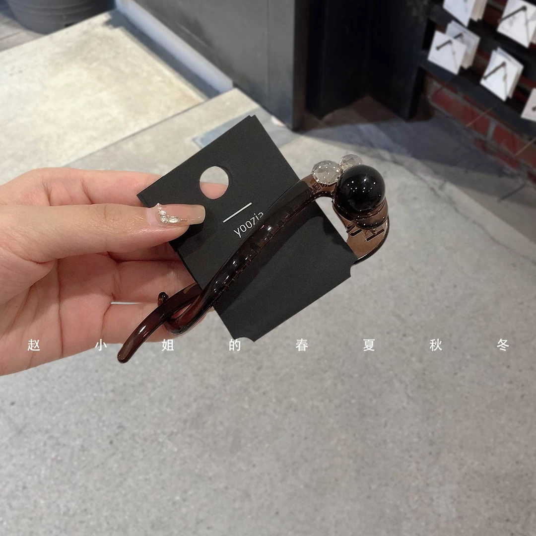 2025韩国发饰简约气质后脑勺盘发抓夹小众独特设计水钻扭扭夹