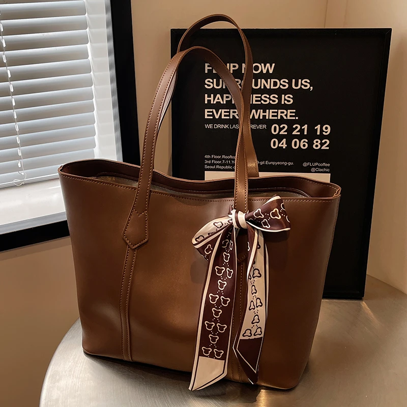 大容量女包通勤潮春季单肩托特包包女款爆款2025新款硬底简约百搭