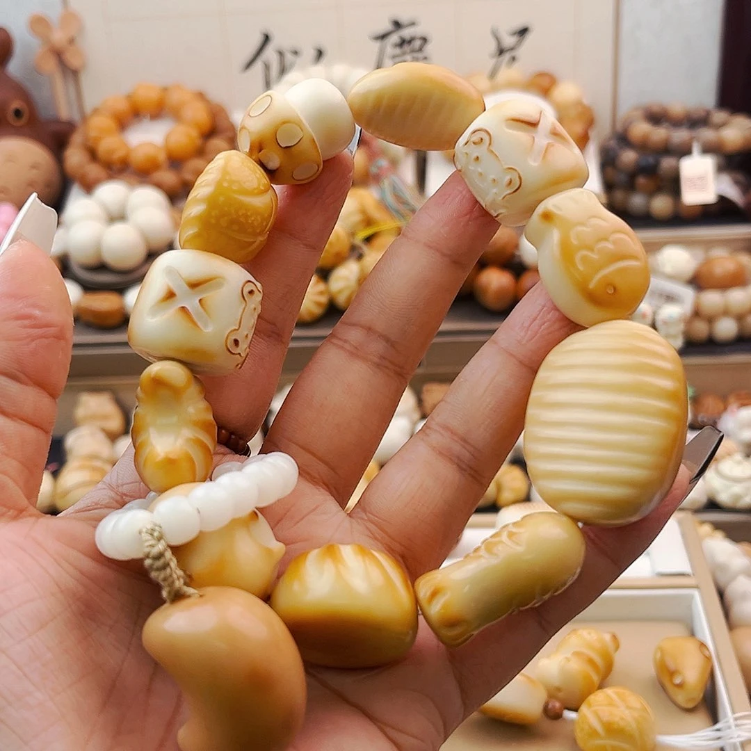 菩提根/象牙果手串卷****）卷卷