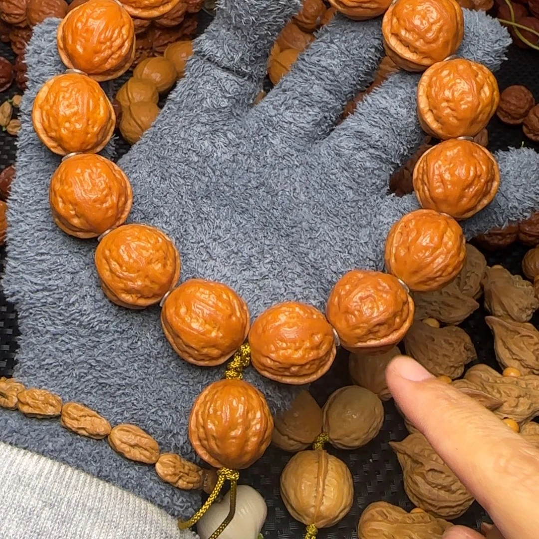 文玩核桃吊坠玉化皮一到筋蚂蚁纹手持