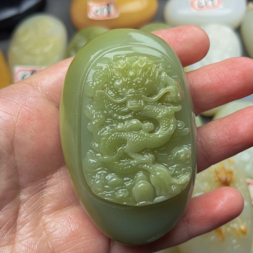 光***岁石材方解石手把件龙