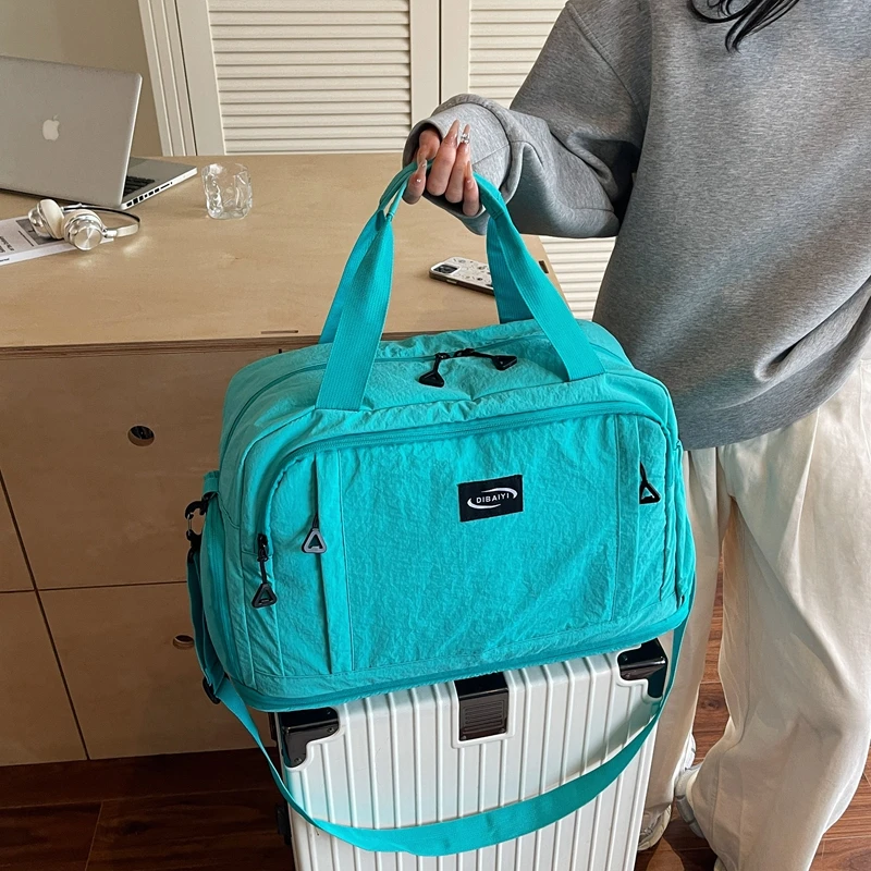 大容量短途旅行包女手提轻便出差行李袋可扩容防水收纳运动健身包