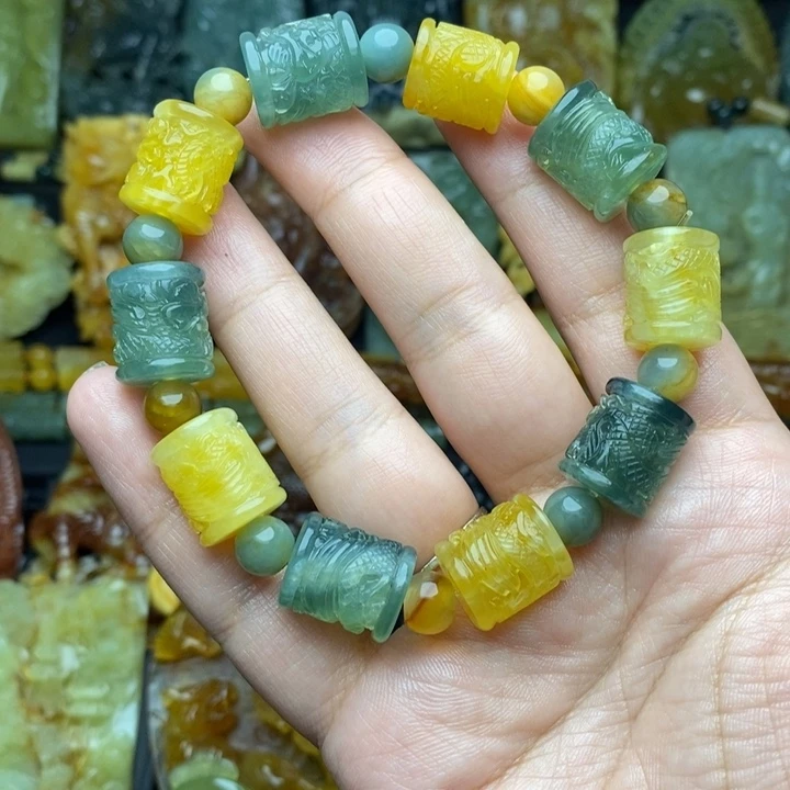 哼***亮蛇纹石玉未镶嵌手链