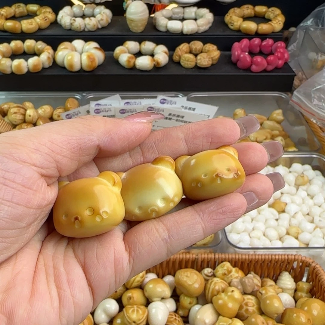 蕊***手串菩提根/象牙果微瑕牙果炭烤熊头3颗