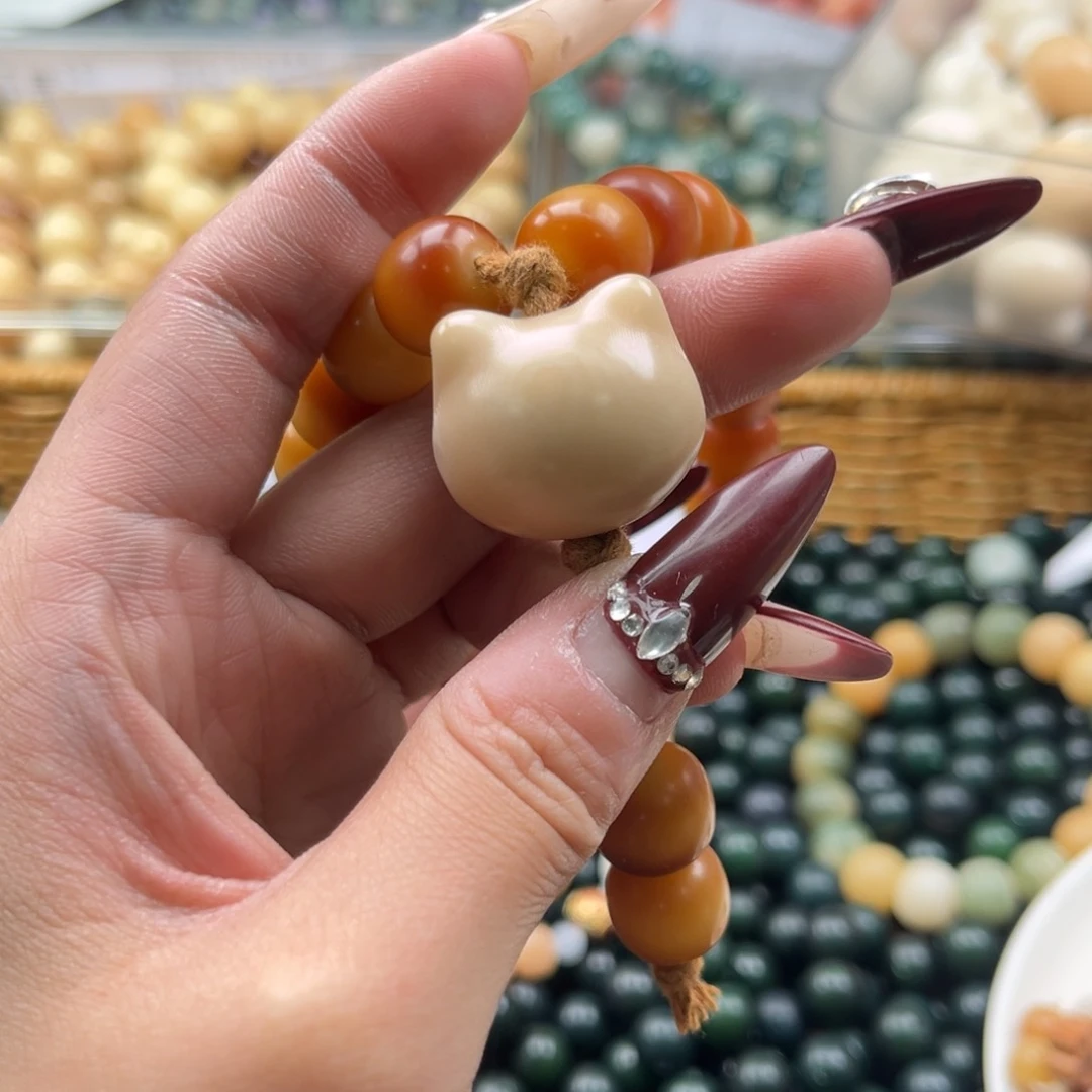 白玉菩提吊坠z15-20mm5颗。微瑕牙牙果猫头