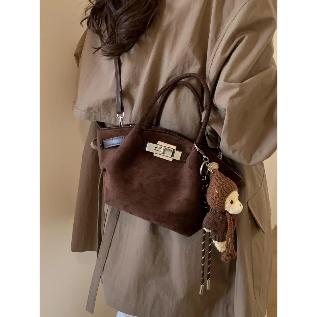 高级感小众包包女2025新款秋冬季复古麂皮绒斜挎包爆款手提水桶包