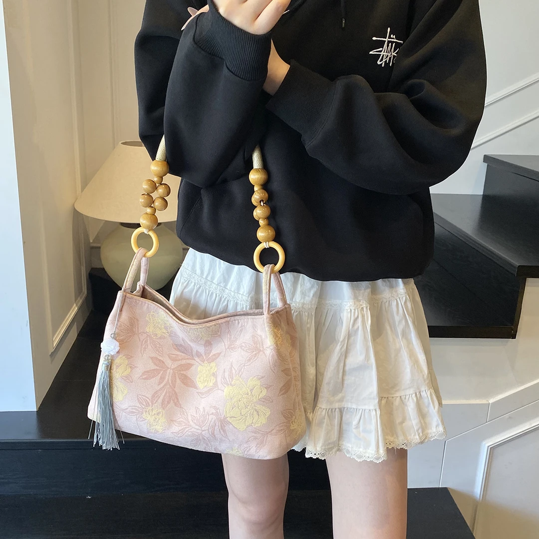 新中式国风包包女包2025新款夏季高级感单肩腋下包通勤手提水桶包