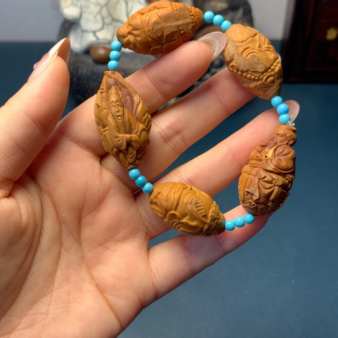 橄榄核手串/手链djxjvgjkgnnbn