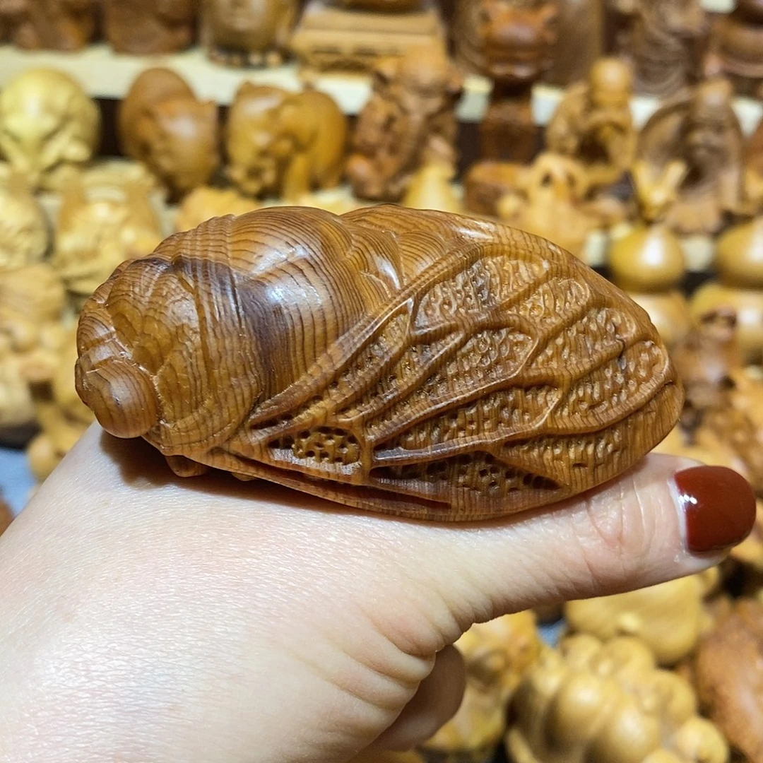 木爱***仔崖柏手把件，一鸣惊人