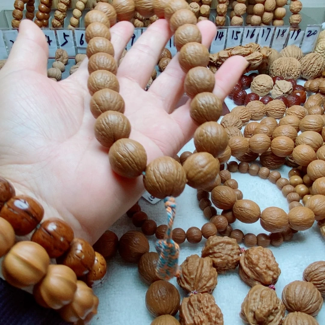 风***里猴头核桃手串光头强手持