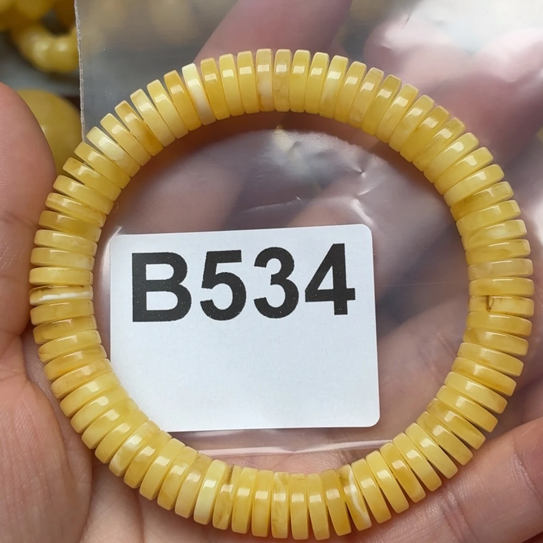 蜜蜡未镶嵌裸石微瑕9/2.2左右